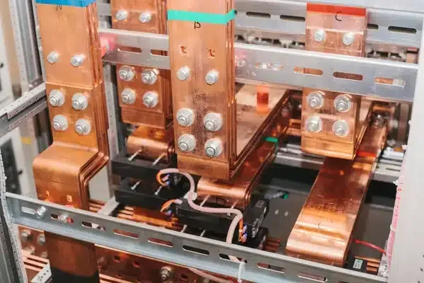 Custom copper busing assembly with bolted connections